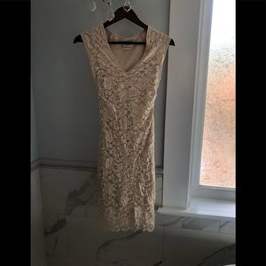 Form fitting ivory lace dress